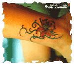 Tatuaże - GUZIK.GIF
