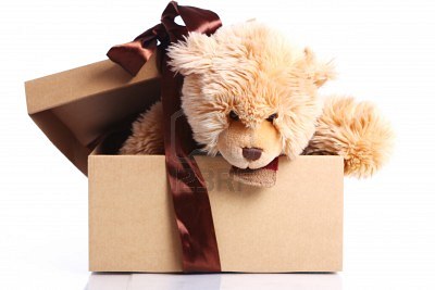 AAA Nasze ukochane Misie Pluszowe - 10556540-cute-teddy-bear-in-the-gift-box-against-white-background.jpg